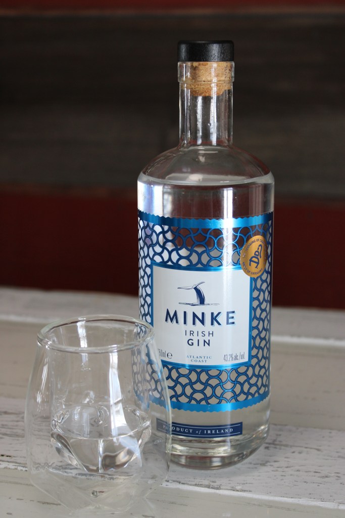 bottle of gin on white bar