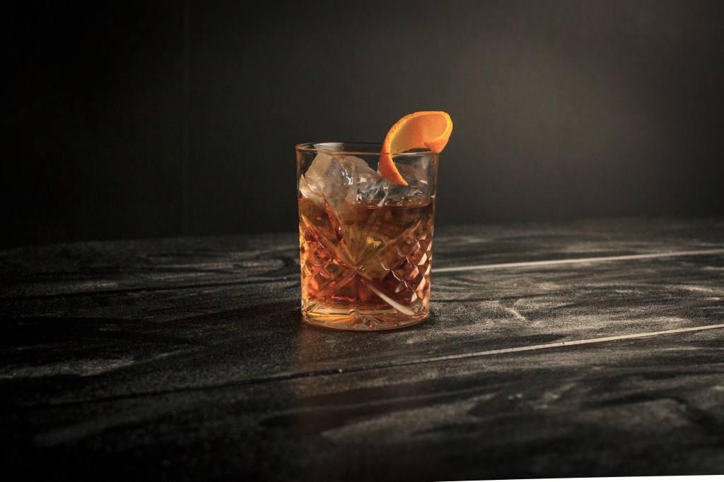 glass with old fashioned cocktail