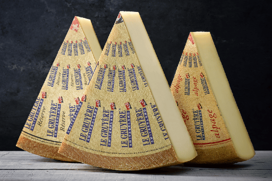 three blocks of gourmet cheese