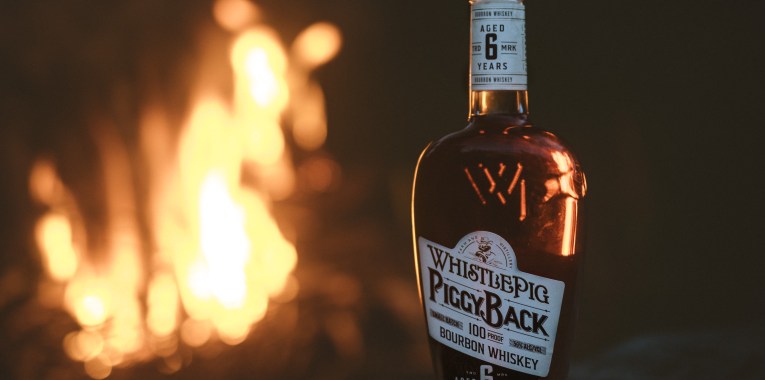 bottle of bourbon by flame