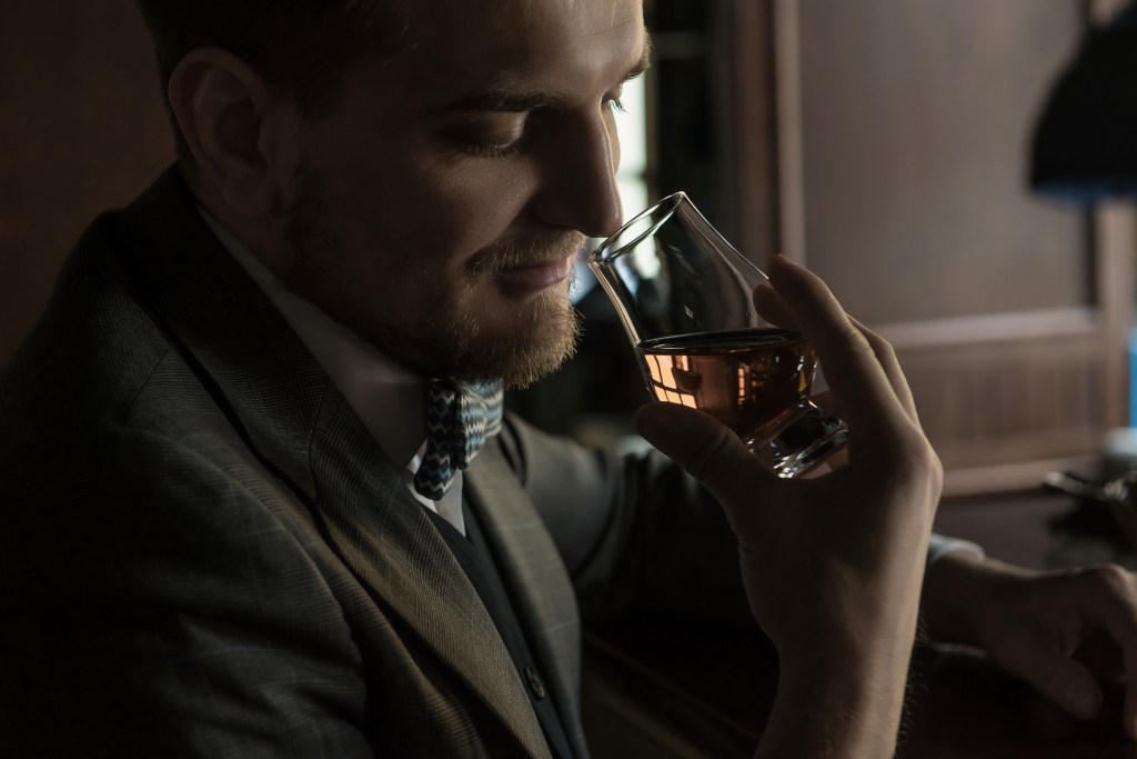 man sniffing Glenlivet 12